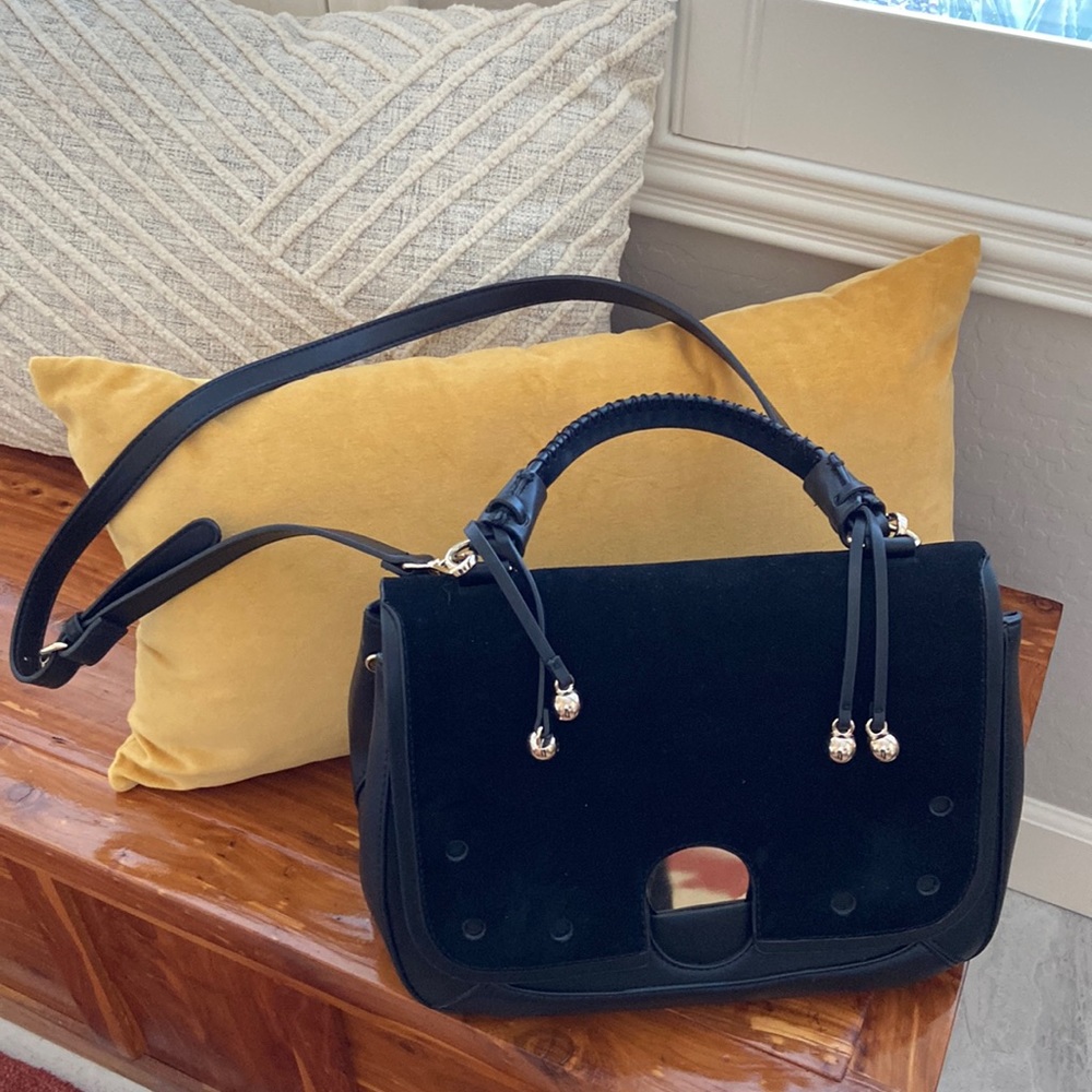 Black leather like and seude clutch and crossbody purse
